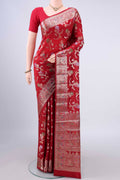 Pure Silk Red Banarasi Raw Saree with Zari And Thread Butta on the body and Zari Border.  displayed on a mannequin