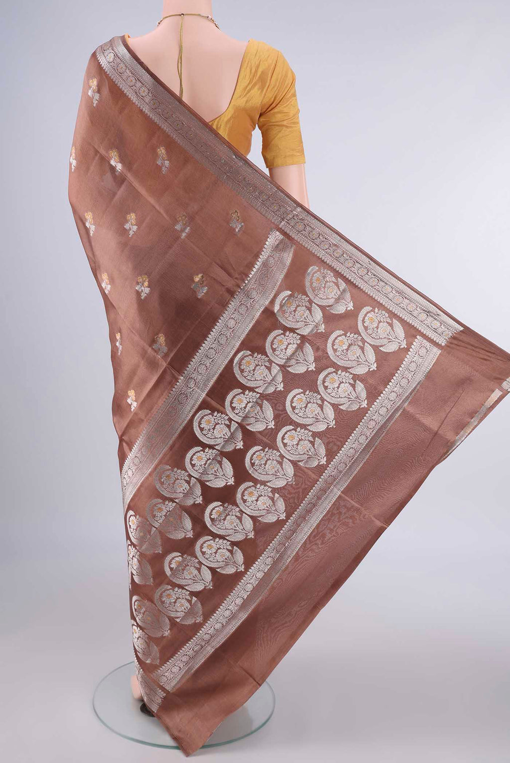 Flat view of Pure Silk Bronze Banarasi Raw Saree with Zari Butta on the body and Zari Border. 