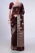 Pure Silk Brown Banarasi Raw Saree with Zari And Thread Butta on the body and Zari Border.  displayed on a mannequin