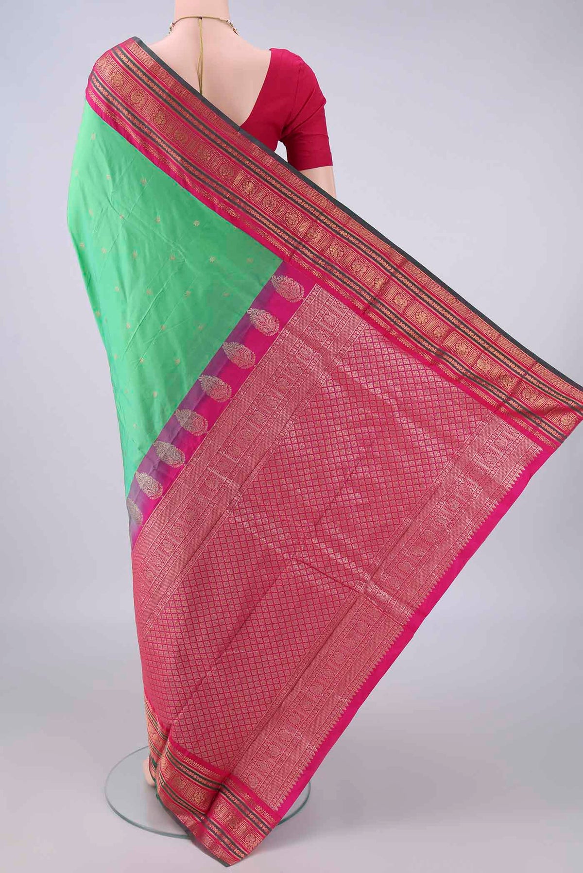 Flat view of Light Green Blended Bangalore Silk Saree with Plain Body and Zari Border. 