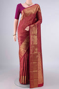Pure Silk Maroon Kanjivaram Saree with Zari Brocade on the body and Zari Border.  displayed on a mannequin