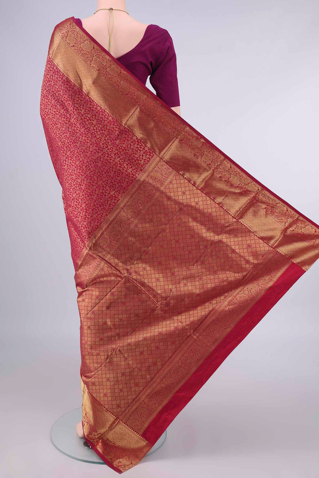 Flat view of Pure Silk Maroon Kanjivaram Saree with Zari Brocade on the body and Zari Border. 