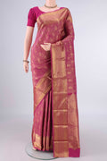Pure Silk Rani Pink Kanjivaram Saree with Zari Brocade on the body and Zari Border.  displayed on a mannequin