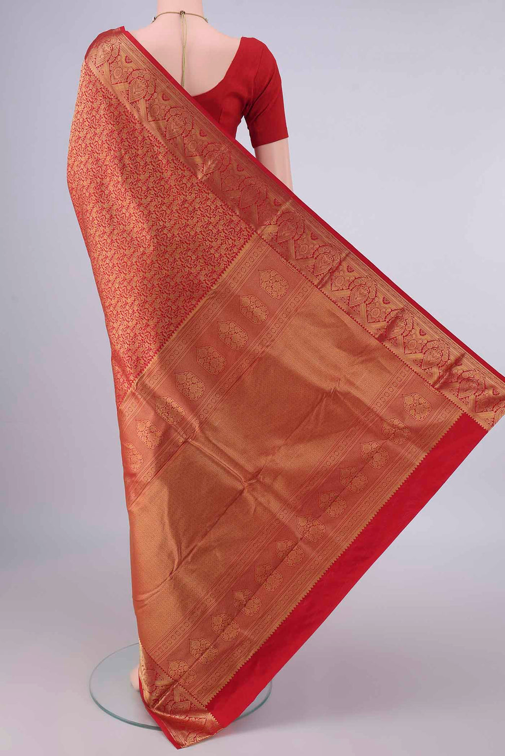 Flat view of Pure Silk Red Kanjivaram Saree with Zari Brocade on the body and Zari Border. 