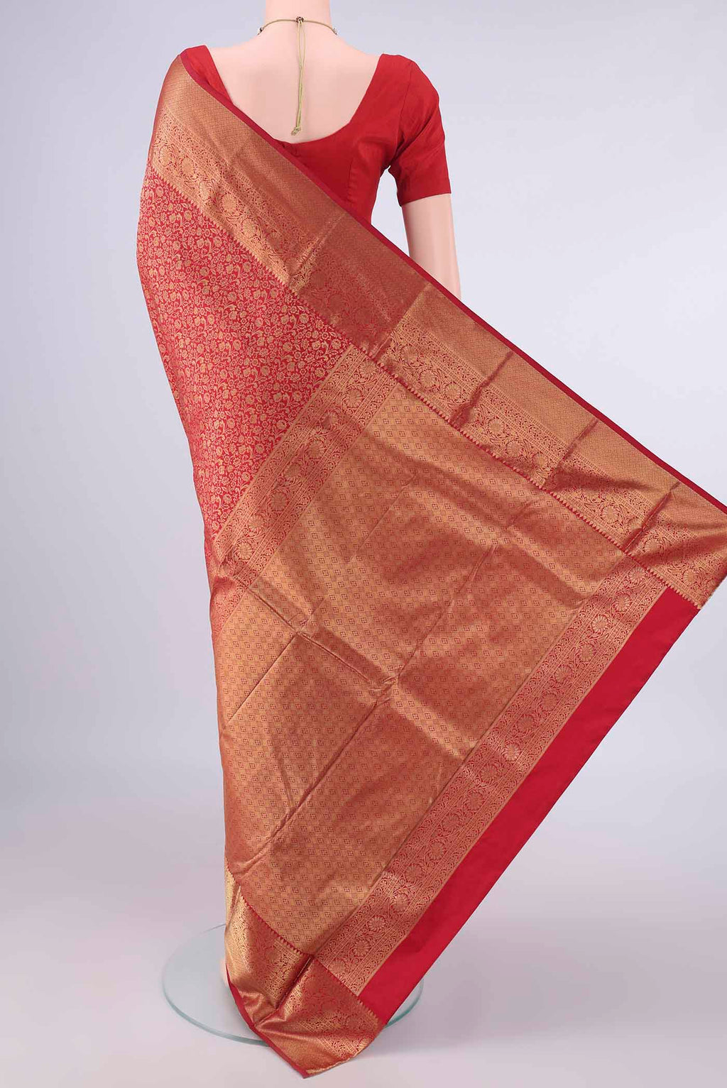 Flat view of Pure Silk Red Kanjivaram Saree with Zari Brocade on the body and Zari Border. 