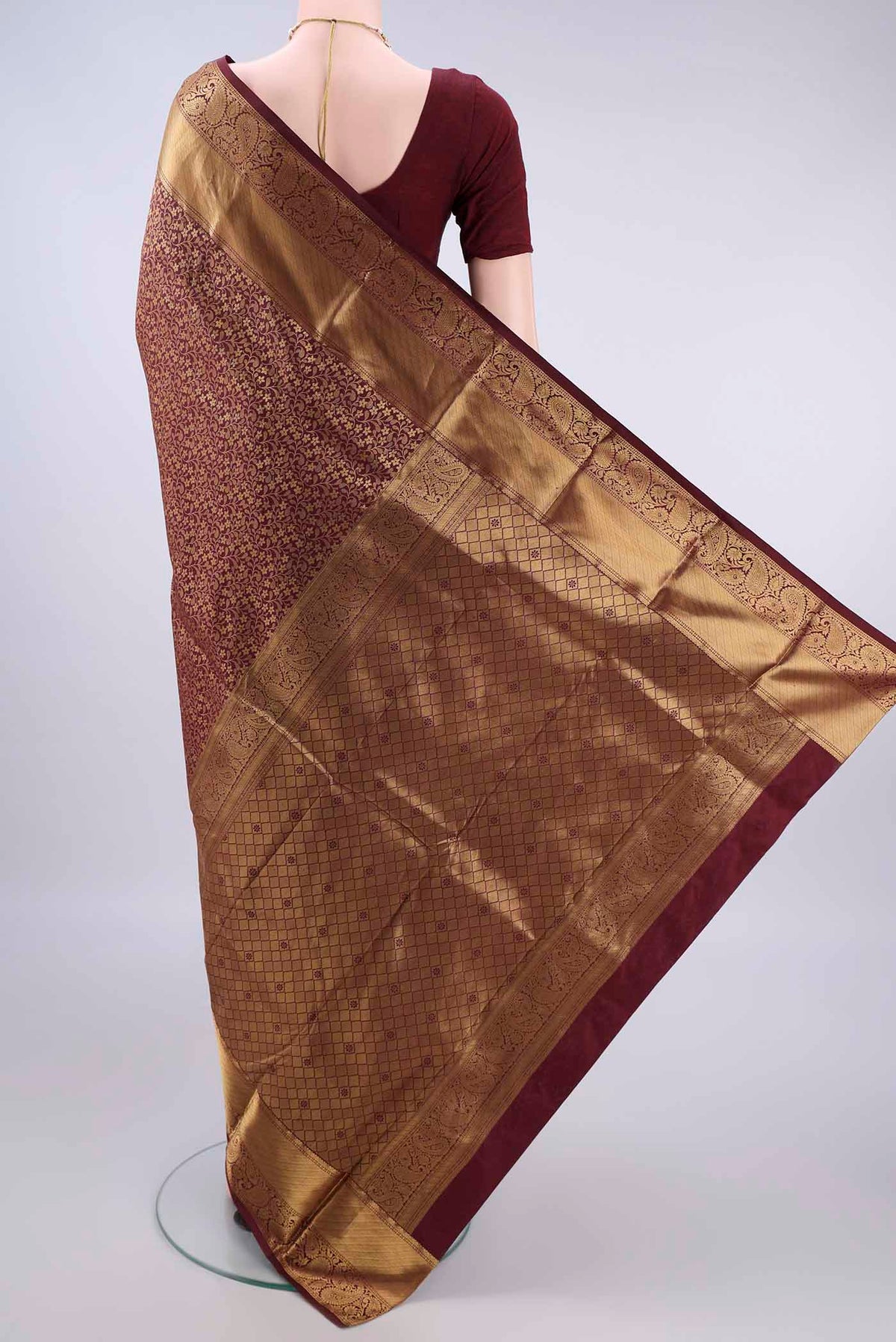 Flat view of Pure Silk Brown Kanjivaram Saree with Zari Brocade on the body and Zari Border. 