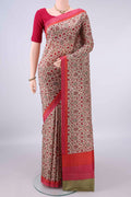Pure Silk Beige Printed Saree with Printed design on the body and Plain Border.  displayed on a mannequin