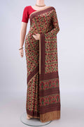 Pure Silk Dark Beige Printed Saree with Printed design on the body and Printed Border.  displayed on a mannequin