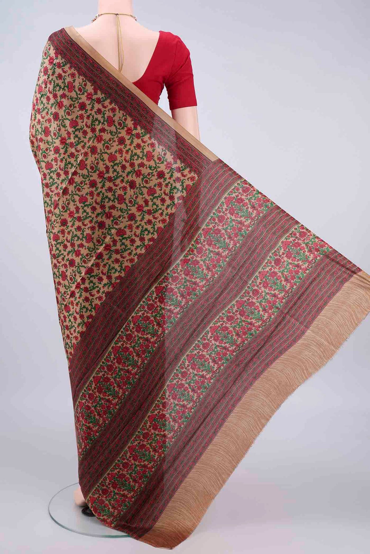 Flat view of Pure Silk Dark Beige Printed Saree with Printed design on the body and Printed Border. 
