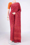 Pure Silk Coral Printed Saree with Printed design on the body and Plain Border.  displayed on a mannequin