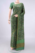 Pure Silk Green Printed Saree with Printed design on the body and Plain Border.  displayed on a mannequin
