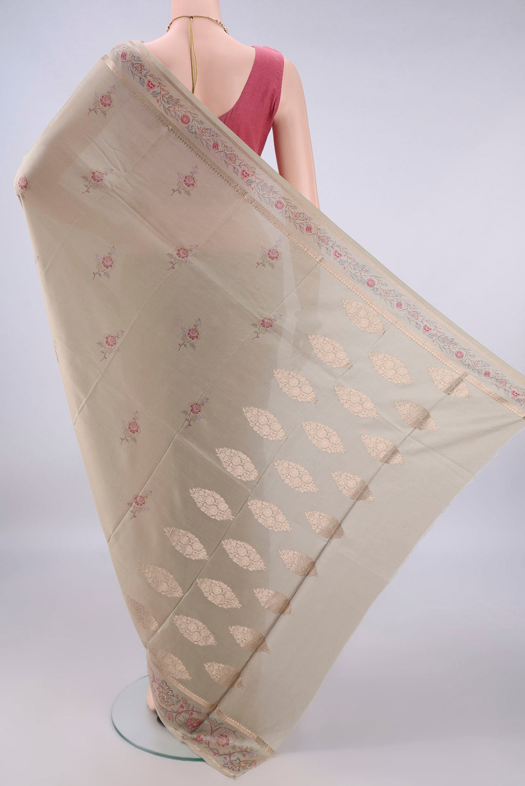 Flat view of Pure Silk Beige Printed Saree with Printed design on the body and Zari Border. 