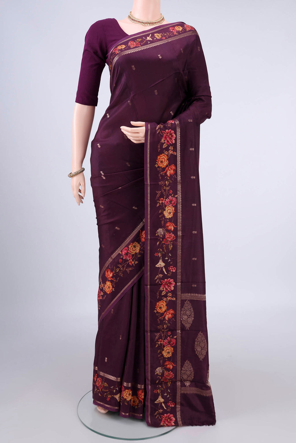 Pure Silk Burgundy Printed Saree with Zari Butta on the body and Zari Border.  displayed on a mannequin