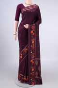 Pure Silk Burgundy Printed Saree with Zari Butta on the body and Zari Border.  displayed on a mannequin