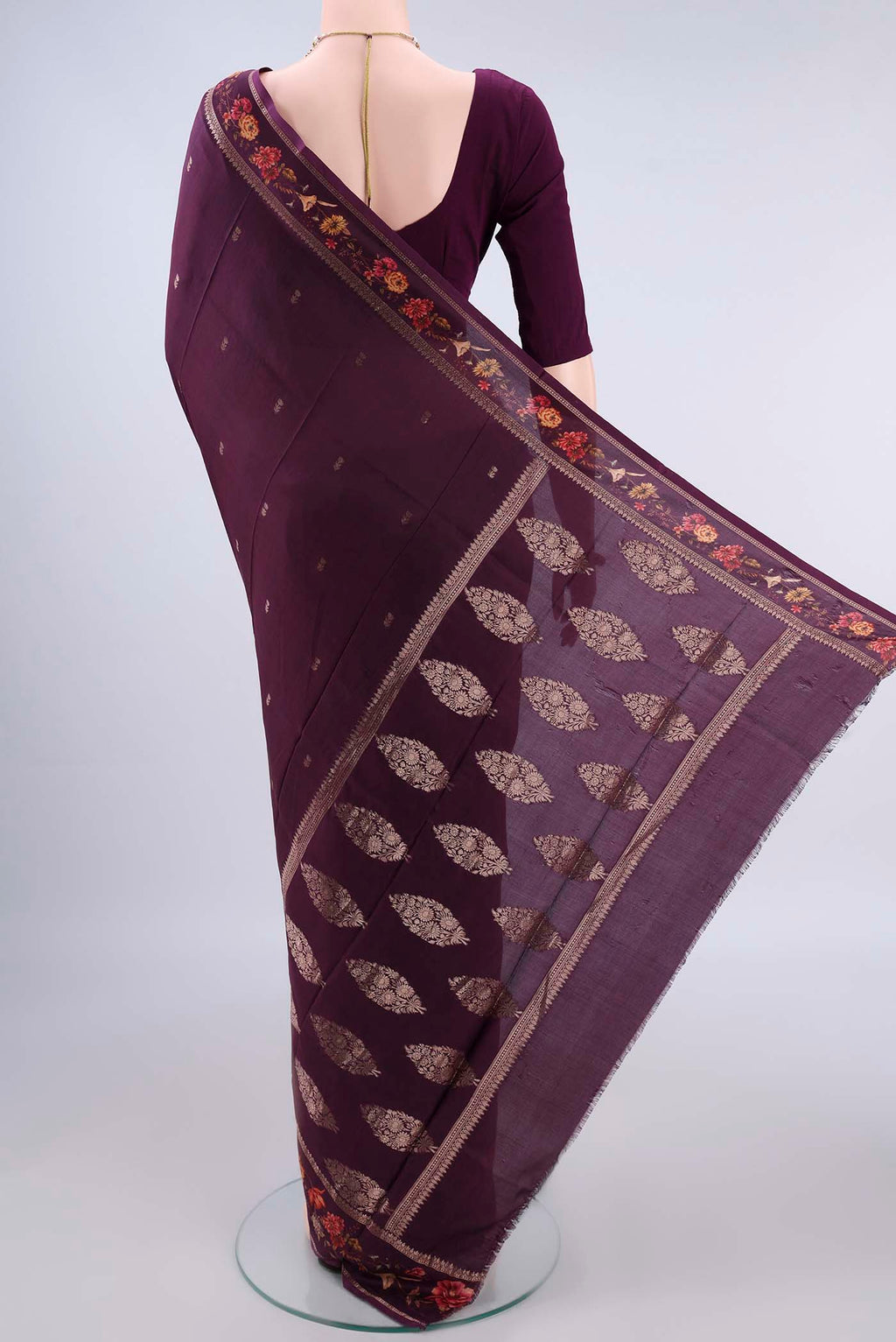 Flat view of Pure Silk Burgundy Printed Saree with Zari Butta on the body and Zari Border. 