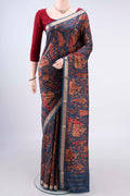 Pure Silk Peacock Blue Printed Saree with Printed design on the body and Zari Border.  displayed on a mannequin