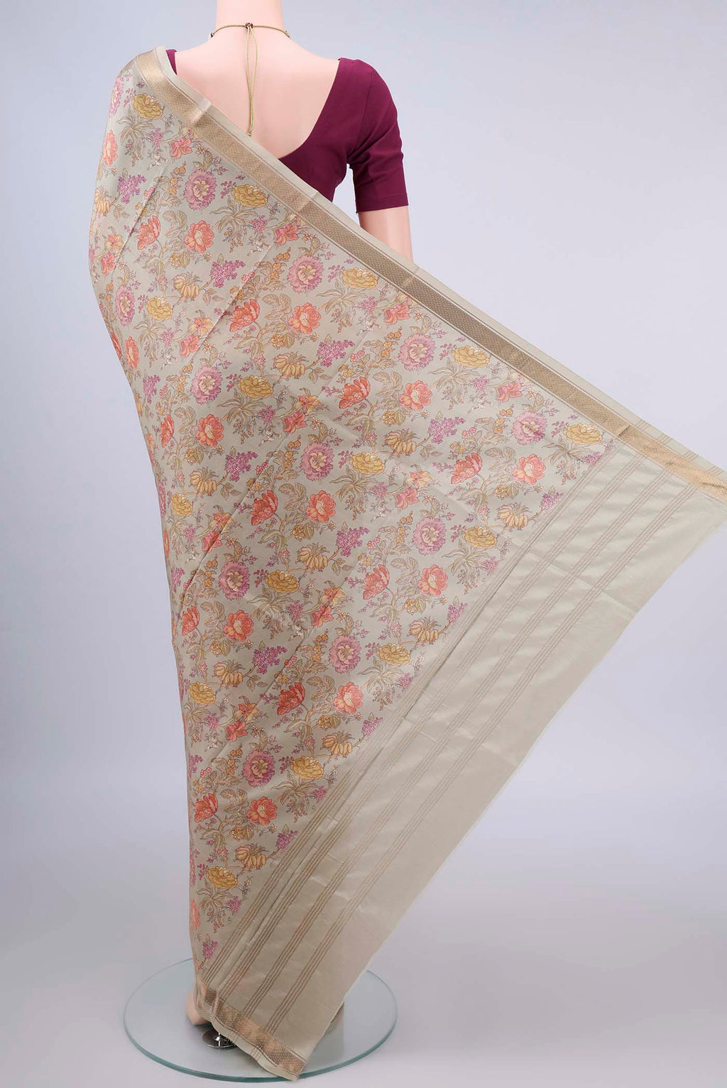Flat view of Pure Silk Beige Printed Saree with Printed design on the body and Zari Border. 