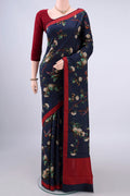 Pure Silk Navy Blue Printed Saree with Printed design on the body and Thread Border.  displayed on a mannequin