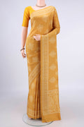 Pure Silk Mustard Printed Saree with Printed design on the body and Printed Border.  displayed on a mannequin