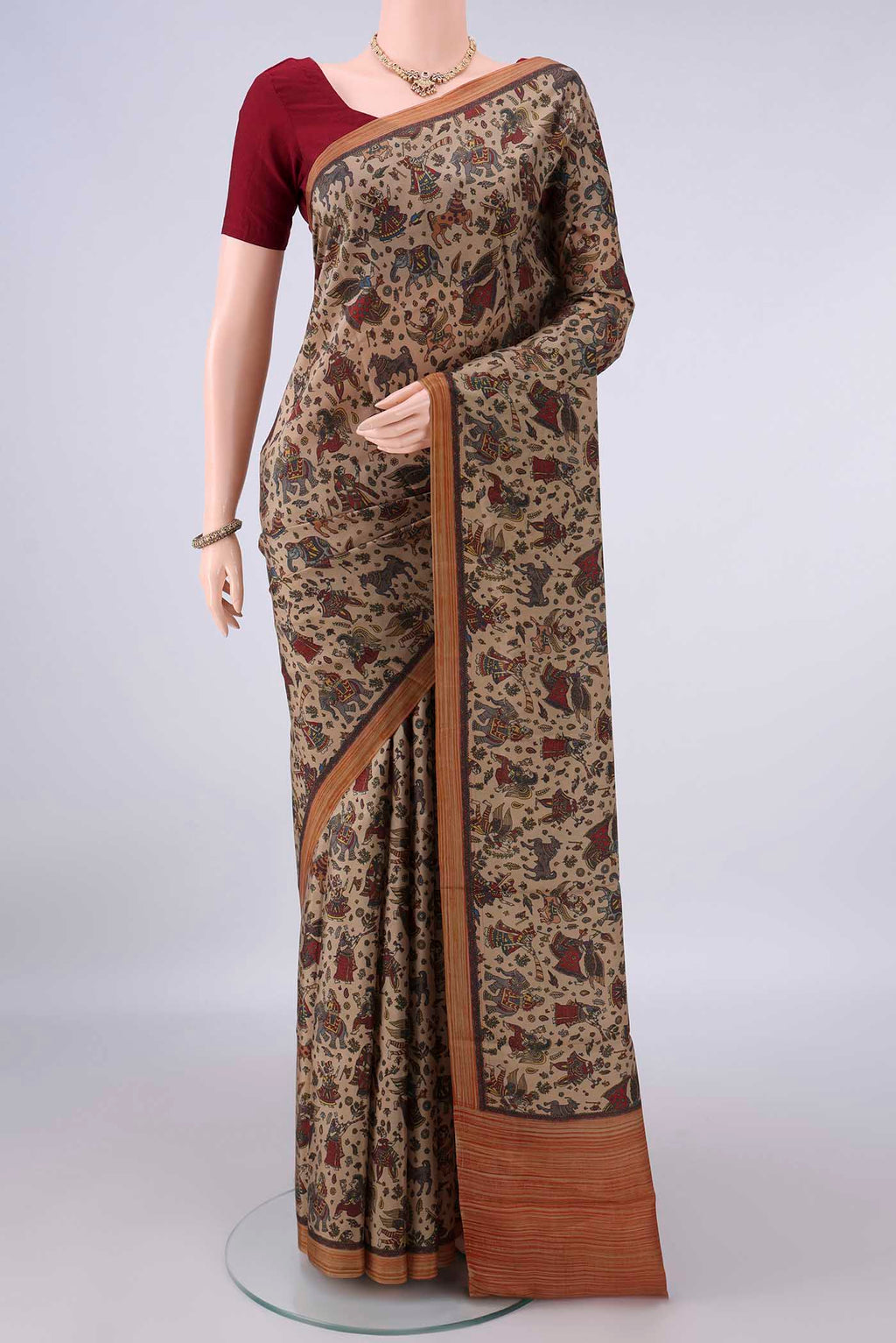 Pure Silk Dark Beige Printed Saree with Printed design on the body and Plain Border.  displayed on a mannequin