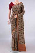 Pure Silk Dark Beige Printed Saree with Printed design on the body and Plain Border.  displayed on a mannequin