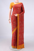 Pure Silk Orange Printed Saree with Printed design on the body and Plain Border.  displayed on a mannequin