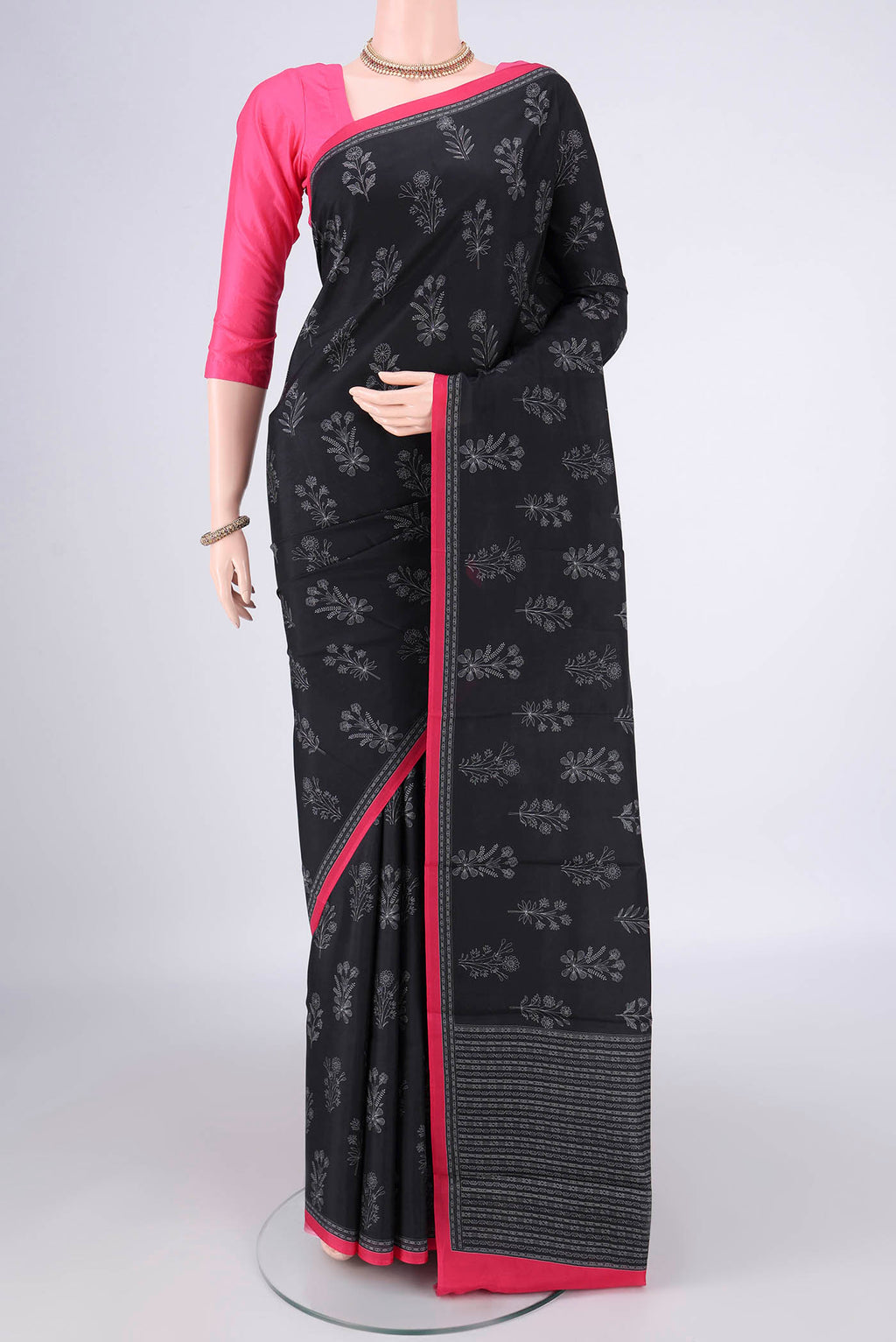 Pure Silk Black Dual Tone Printed Saree with Printed design on the body and Plain Border.  displayed on a mannequin