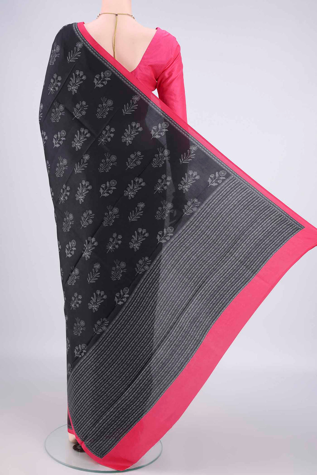 Flat view of Pure Silk Black Dual Tone Printed Saree with Printed design on the body and Plain Border. 