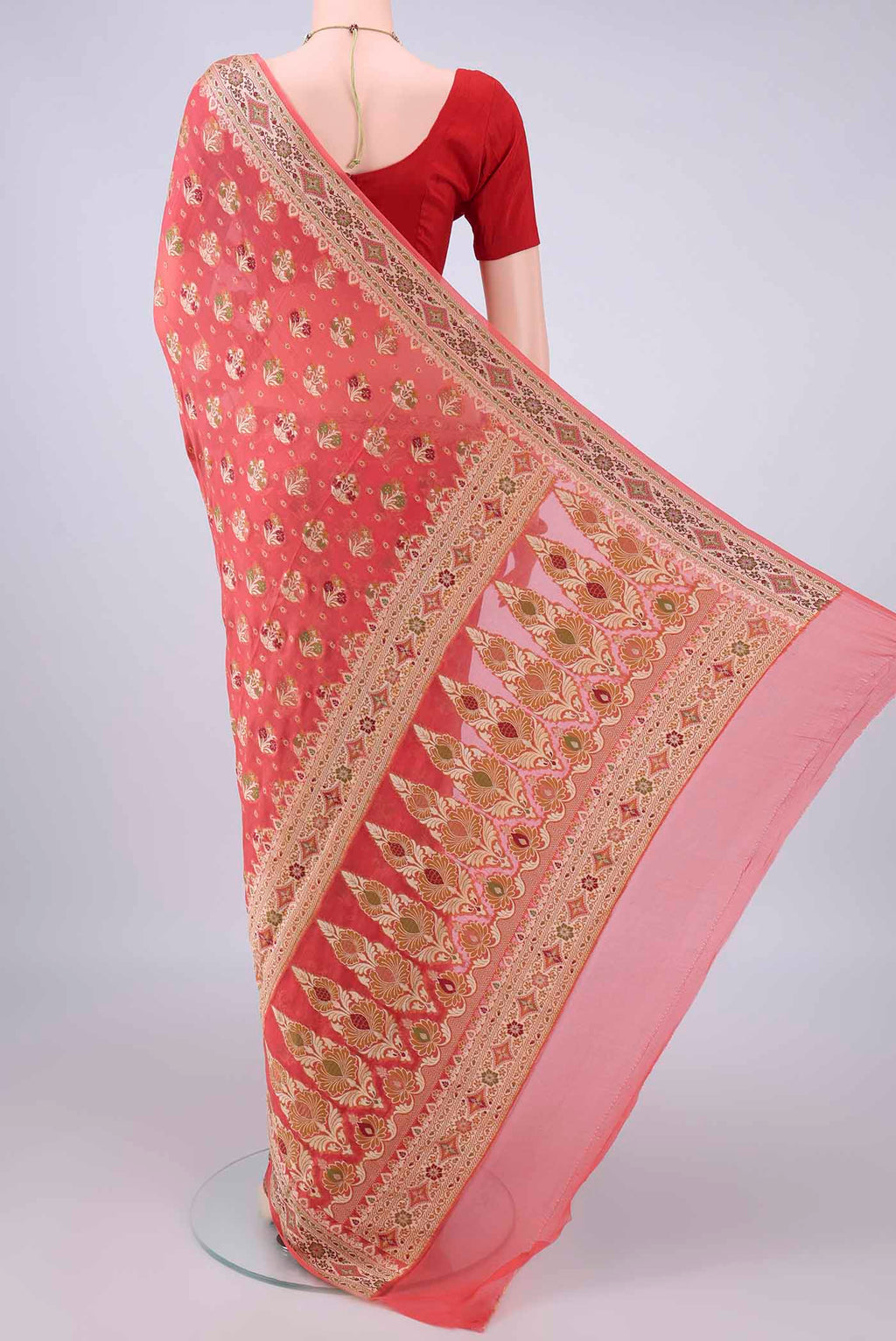 Flat view of Peach Blended Banarasi Georgette Saree with Thread Brocade on the body and Zari And Thread Border. 
