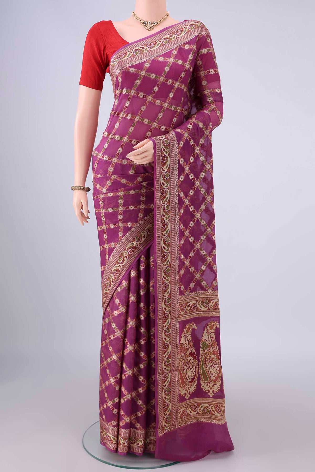 Light Magenta Blended Banarasi Georgette Saree with Thread Brocade on the body and Zari And Thread Border.  displayed on a mannequin
