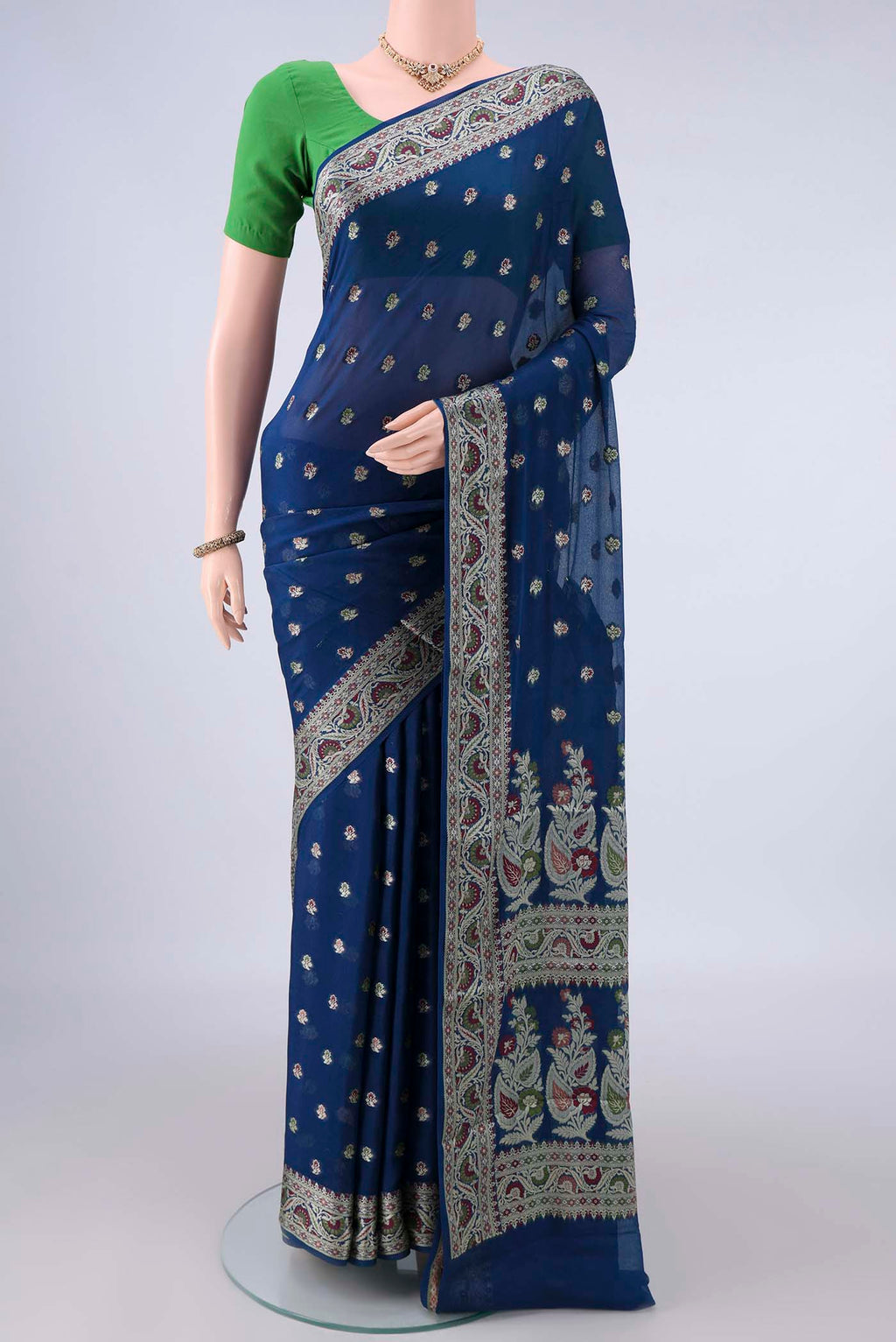 Blue Blended Banarasi Georgette Saree with Thread Butta on the body and Zari And Thread Border.  displayed on a mannequin