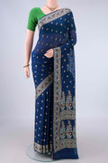Blue Blended Banarasi Georgette Saree with Thread Butta on the body and Zari And Thread Border.  displayed on a mannequin