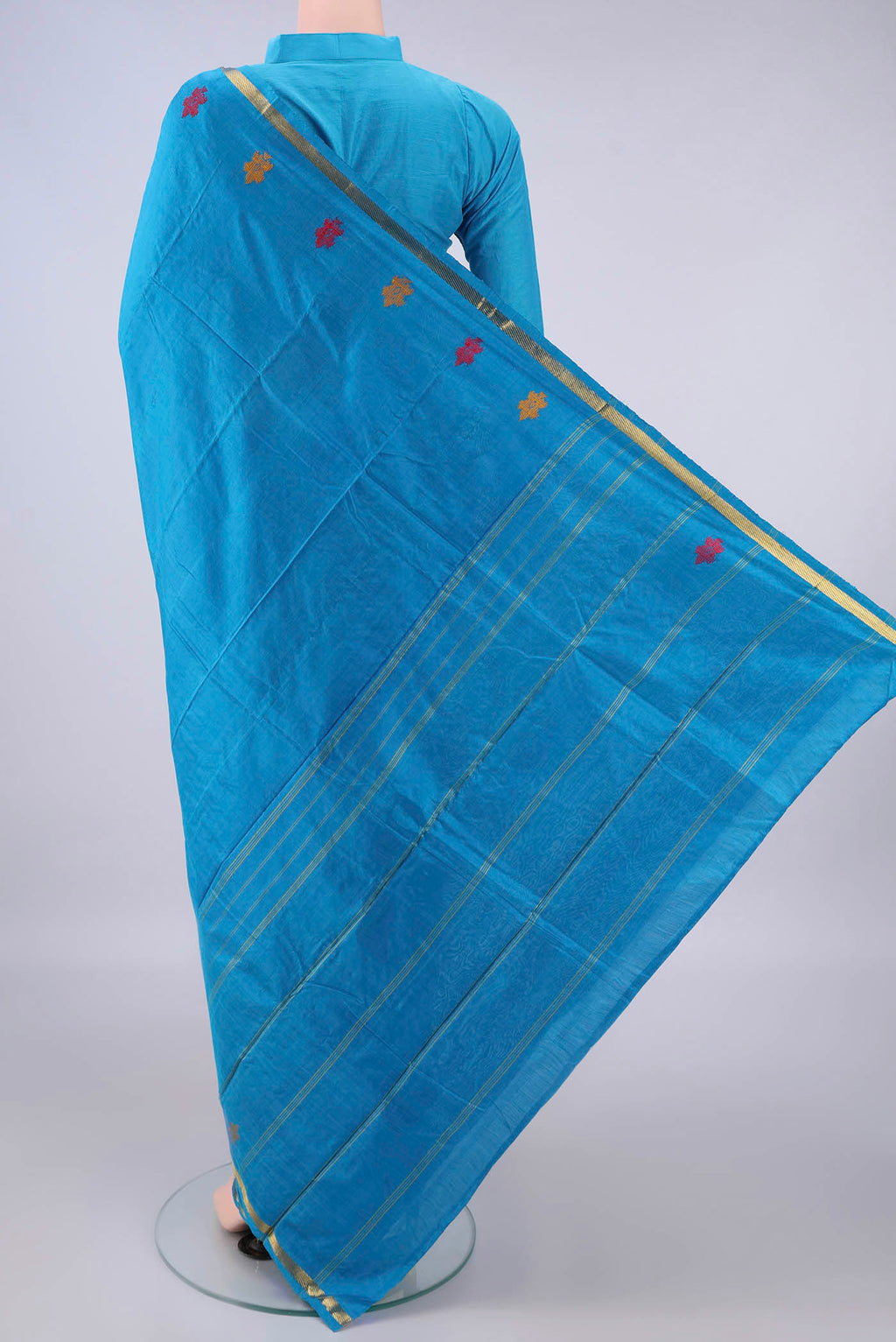 Flat view of Pure Silk Blue Kanchipuram Saree with Plain Body and Zari Border. 
