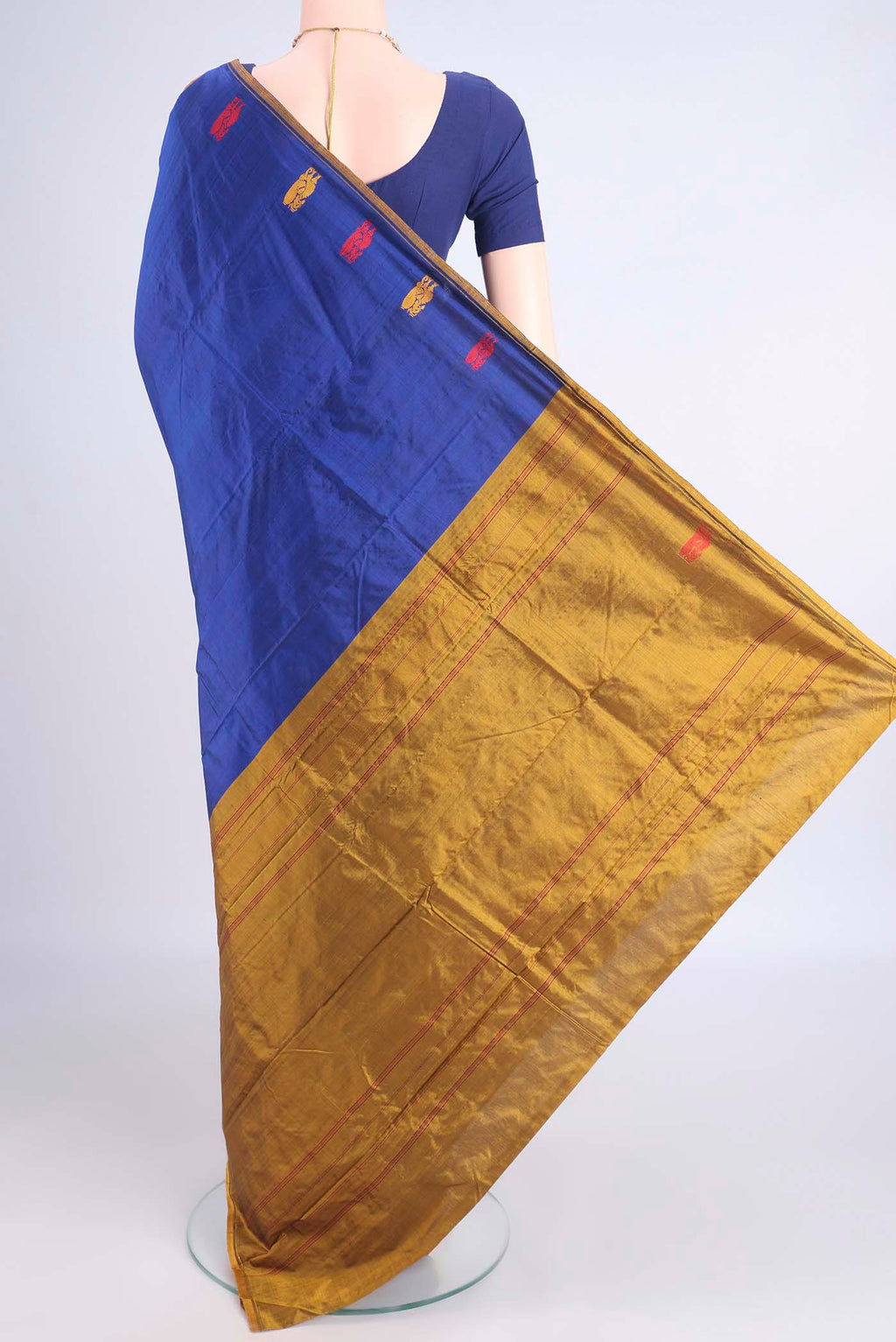 Flat view of Pure Silk Blue Kanchipuram Saree with Plain Body and Zari And Thread Border. 
