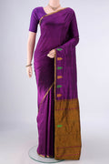 Pure Silk Purple Kanchipuram Saree with Plain Body and Zari And Thread Border.  displayed on a mannequin