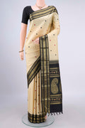 Pure Silk Cream Kanjivaram Saree with Thread Butta on the body and Zari Border.  displayed on a mannequin