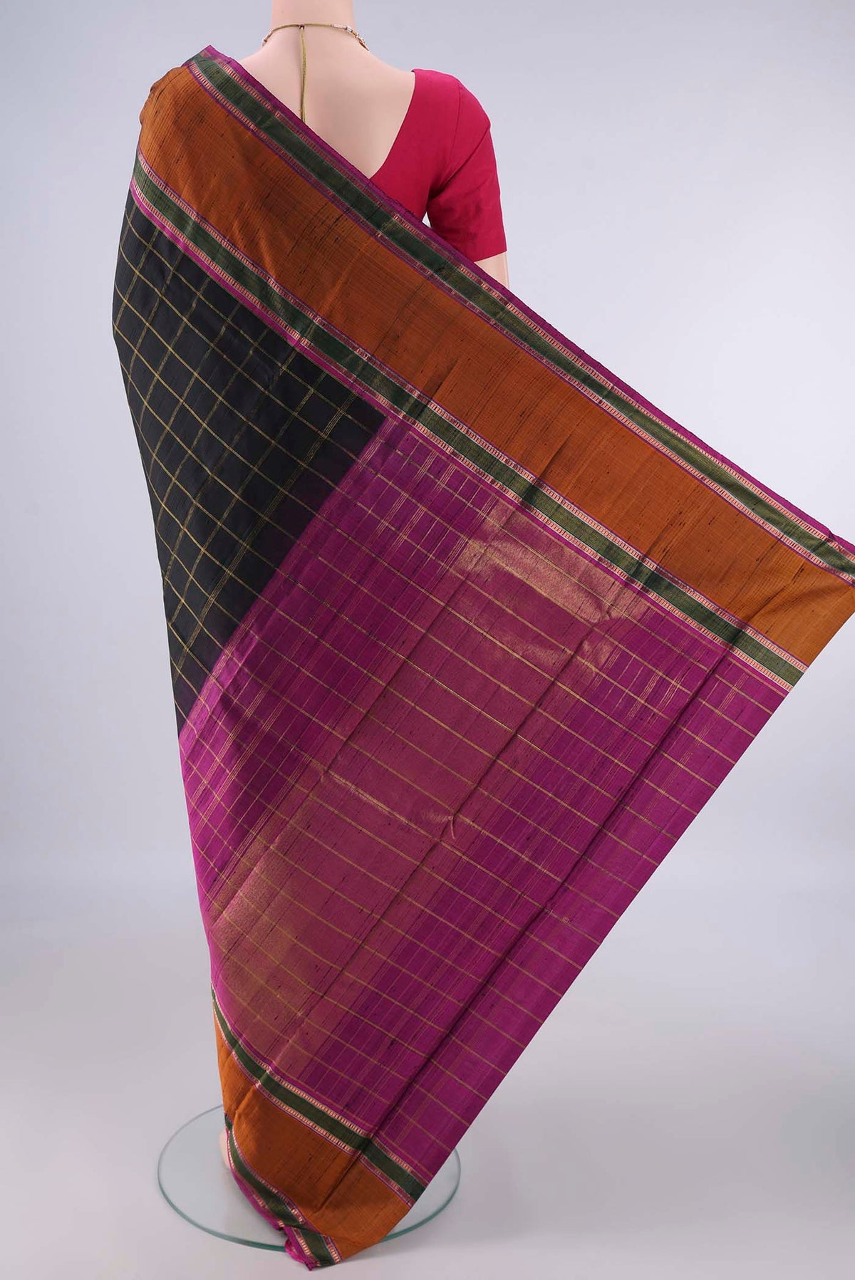 Flat view of Pure Silk Black Kanchipuram Saree with Checked design on the body and Plain Border. 