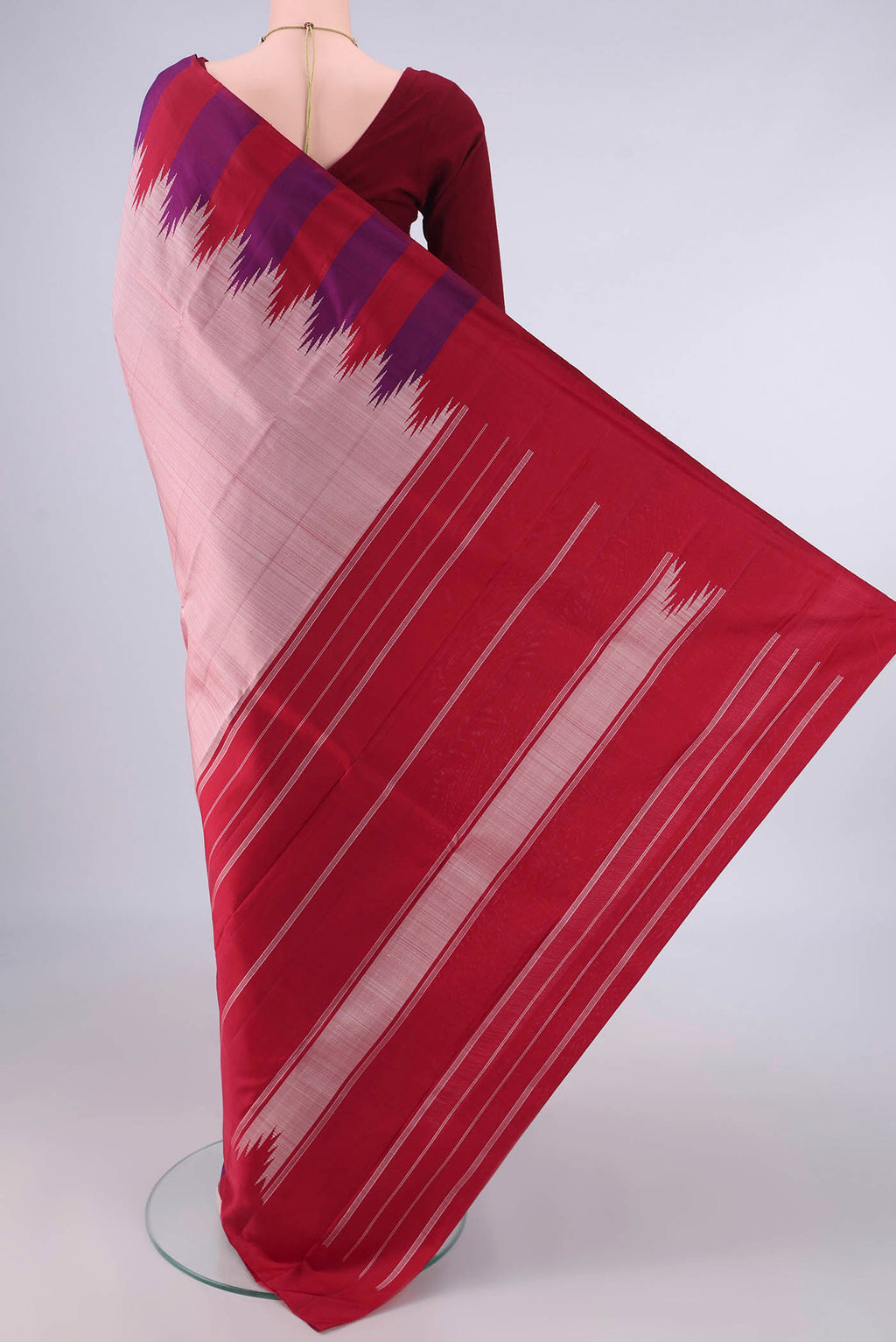 Flat view of Pure Silk Peach Kanjivaram Saree with Plain Body and Temple Border. 