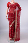 Red Mysore Chiffon Saree with Embroidery on the body and Zari Border.  displayed on a mannequin