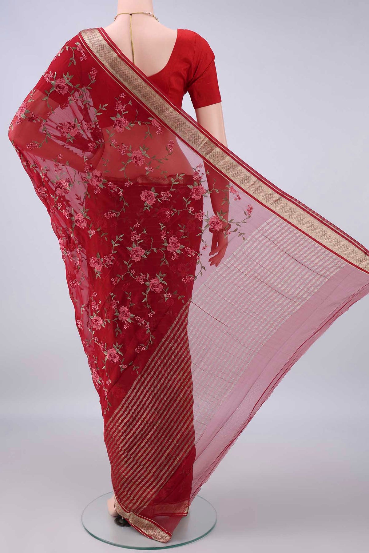 Flat view of Red Mysore Chiffon Saree with Embroidery on the body and Zari Border. 