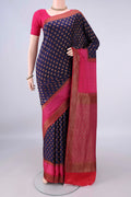 Navy Blue Mysore Crepe Saree with Zari Butta on the body and Zari Border.  displayed on a mannequin