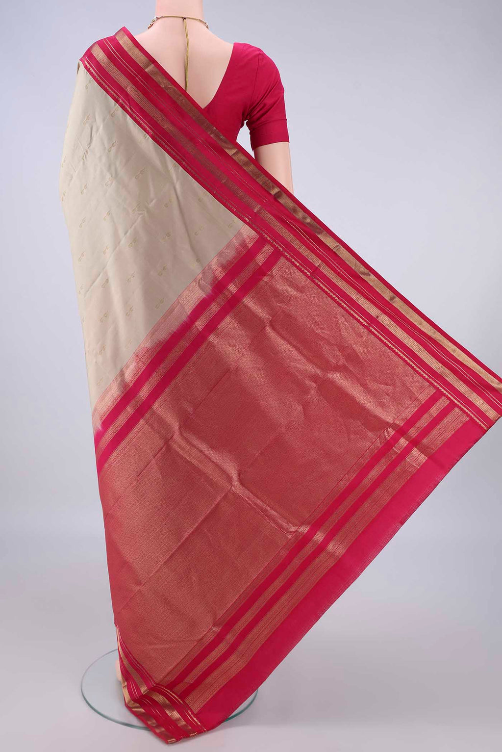 Flat view of Pure Silk Beige Kanchipuram Saree with Zari Butta on the body and Zari Border. 