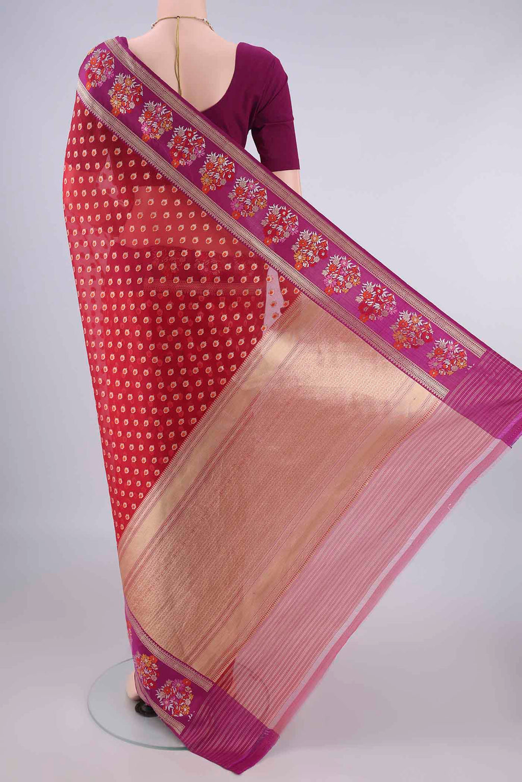 Flat view of Pure Silk Red Banarasi Kora Saree with Zari And Thread Butta on the body and Zari And Thread Border. 