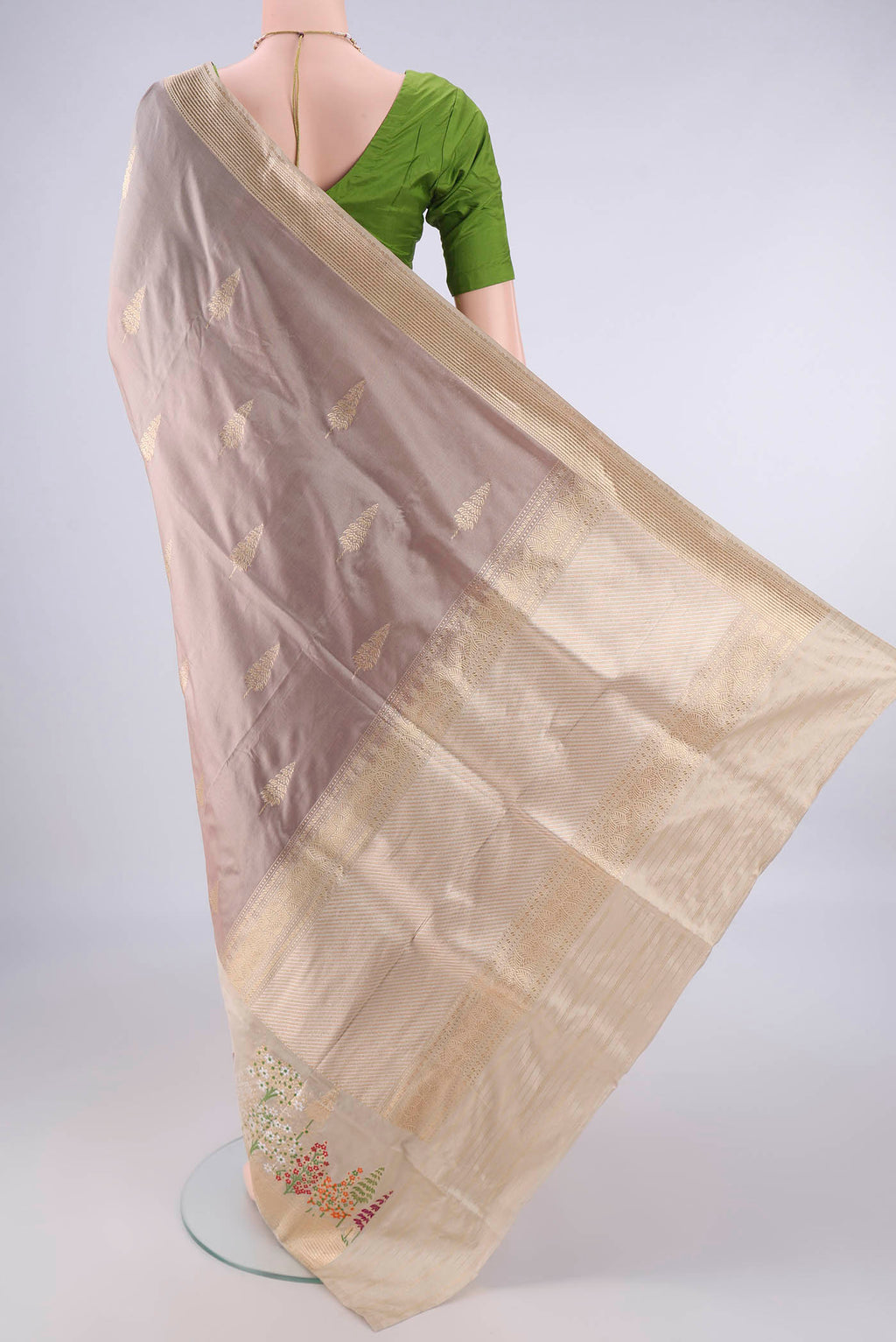 Flat view of Pure Silk Dark Beige Banarasi Saree with Zari Butta on the body and Meenakari Border. 