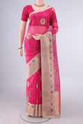 Pure Silk Rani Pink Banarasi Kora Saree with Checked design on the body and Zari And Thread Border.  displayed on a mannequin