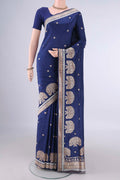 Pure Silk Dark Blue Banarasi Saree with Zari Butta on the body and Zari Border.  displayed on a mannequin
