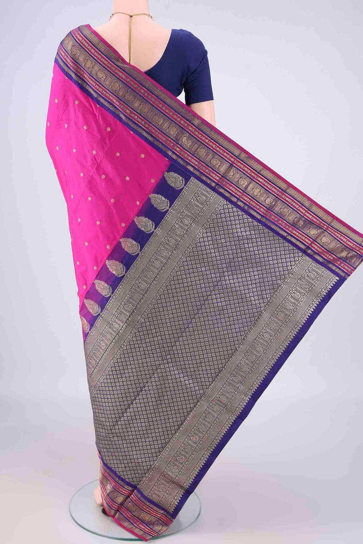 Flat view of Pink Blended Bangalore Silk Saree with Zari Butta on the body and Zari Border. 