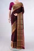 Pure Silk Coffee Brown Kanjivaram Saree with Zari Butta on the body and Zari Border.  displayed on a mannequin
