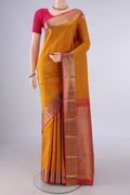 Pure Silk Mustard Kanchipuram Saree with Zari Butta on the body and Zari Border.  displayed on a mannequin