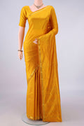 Pure Silk Yellow Kanchipuram Saree with Plain Body and Zari Border.  displayed on a mannequin